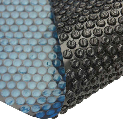 Treibende Pool-Solarplane PE 1200x600 cm Schwarz und Blau